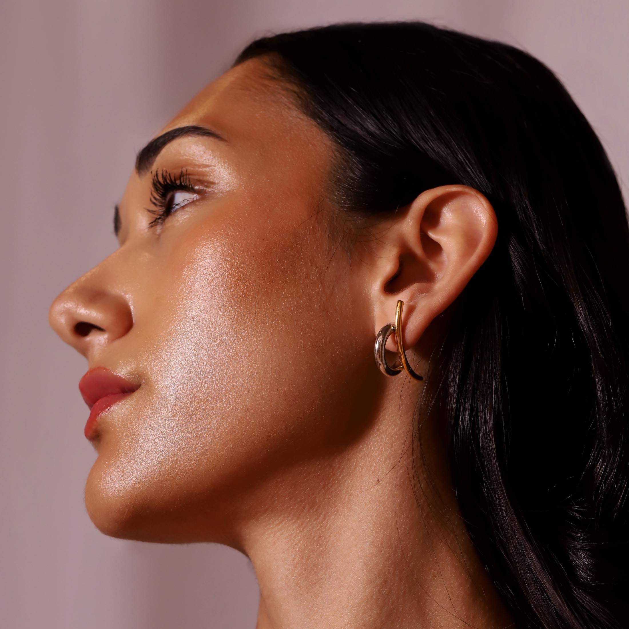 Cora Duo Toned Earring Studs On Model 2