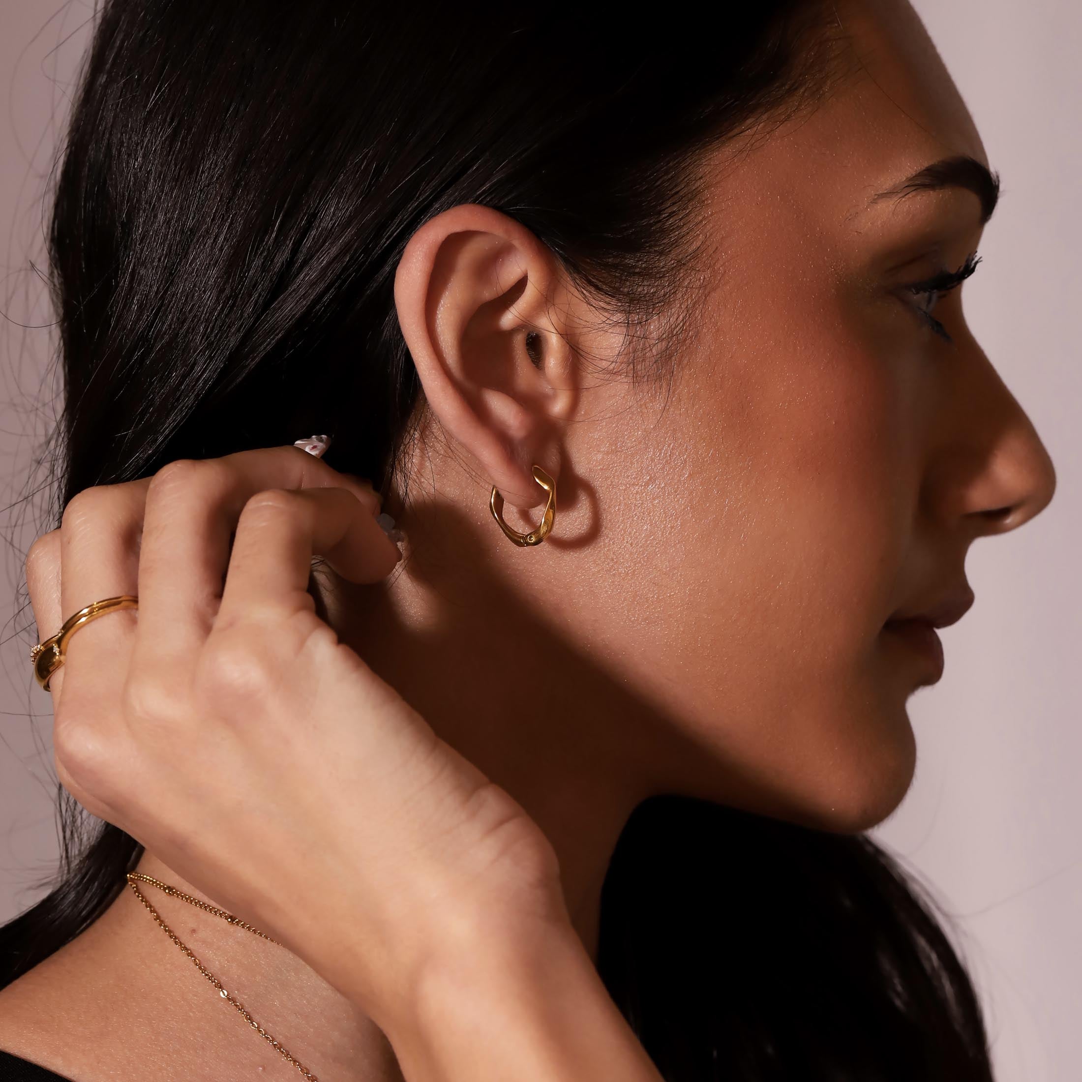 Ripple Hoop Earrings On Model 2 - Gold
