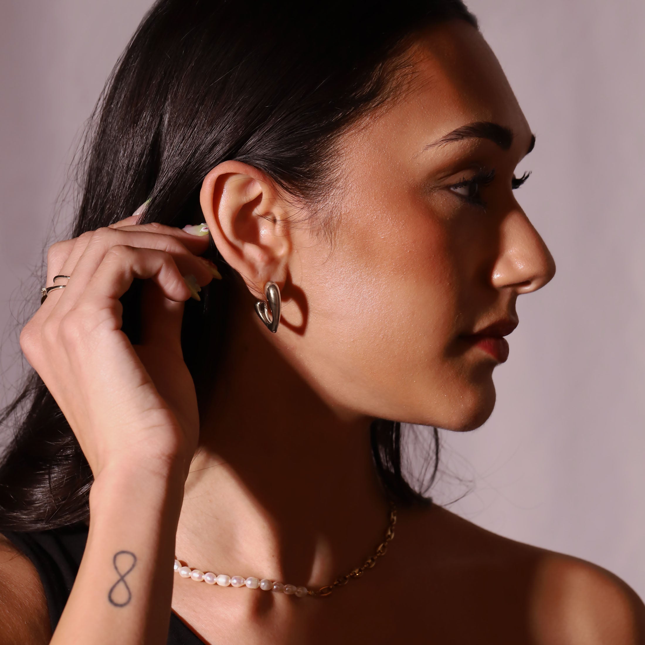 Rita Heart Earring Studs On Model 3 - Silver