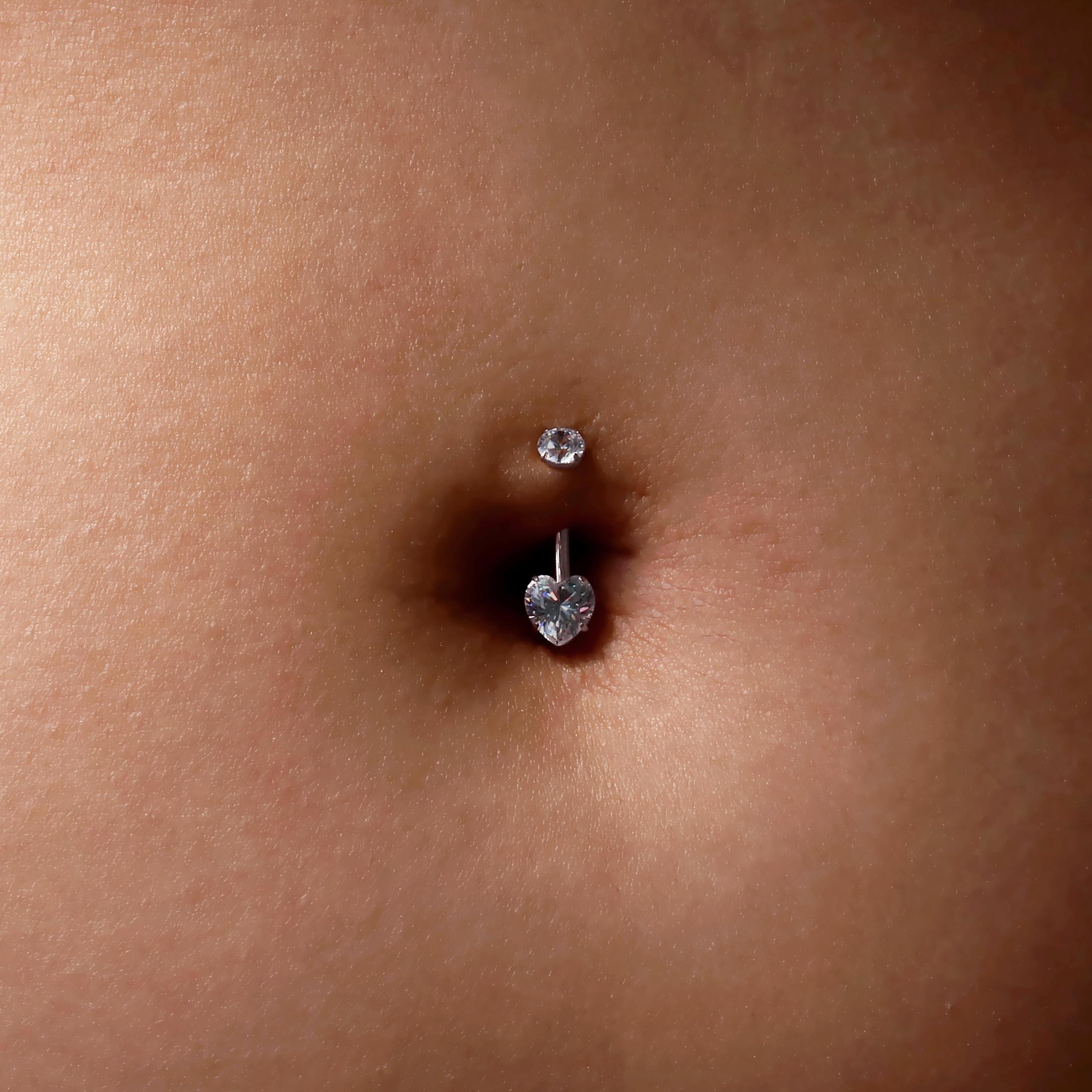 Lust Heart Gemstone Belly Bar Piercing On Model - Silver