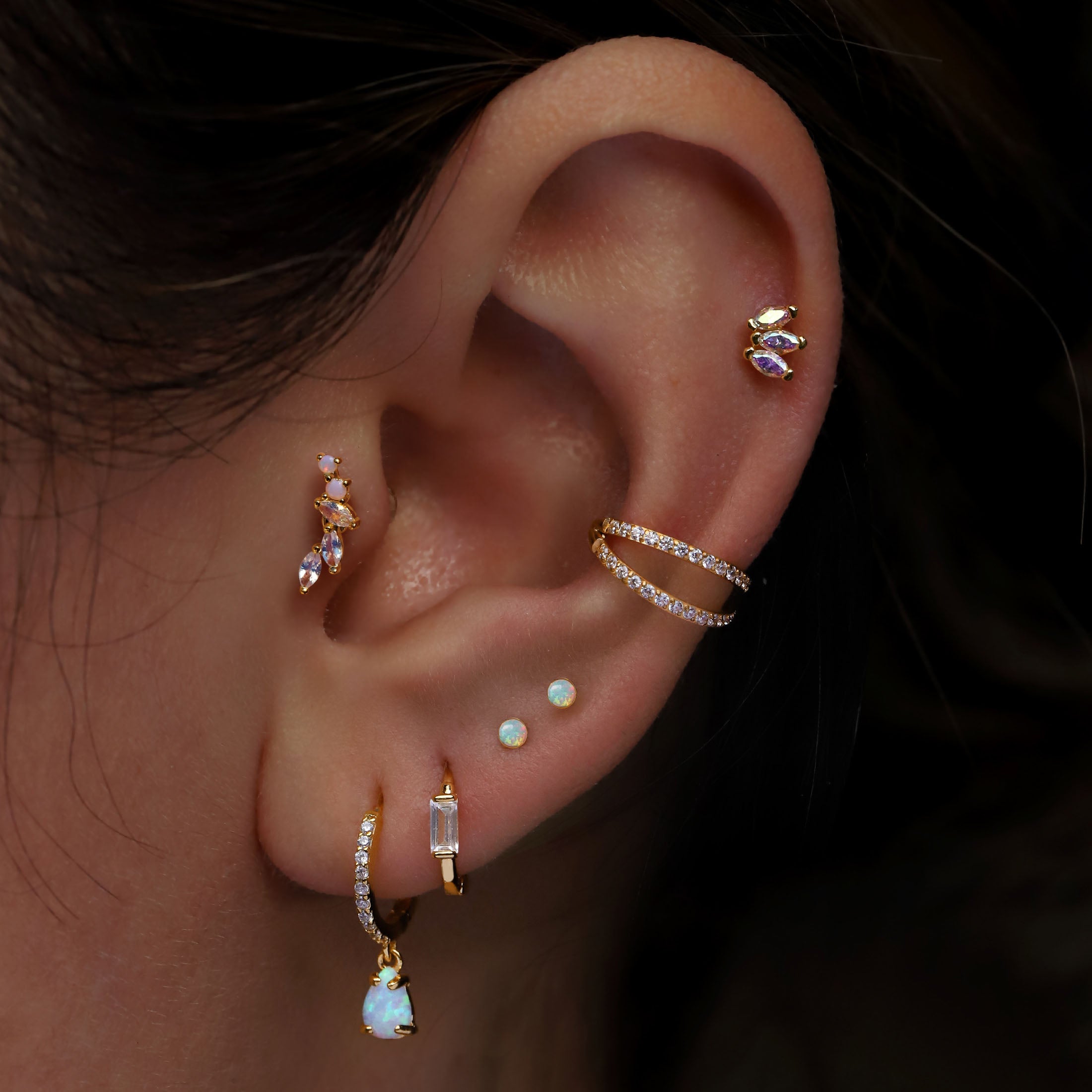 Elixir Opal Helix Tragus Cartilage & Conch Ear Piercing On Model - 14K Gold