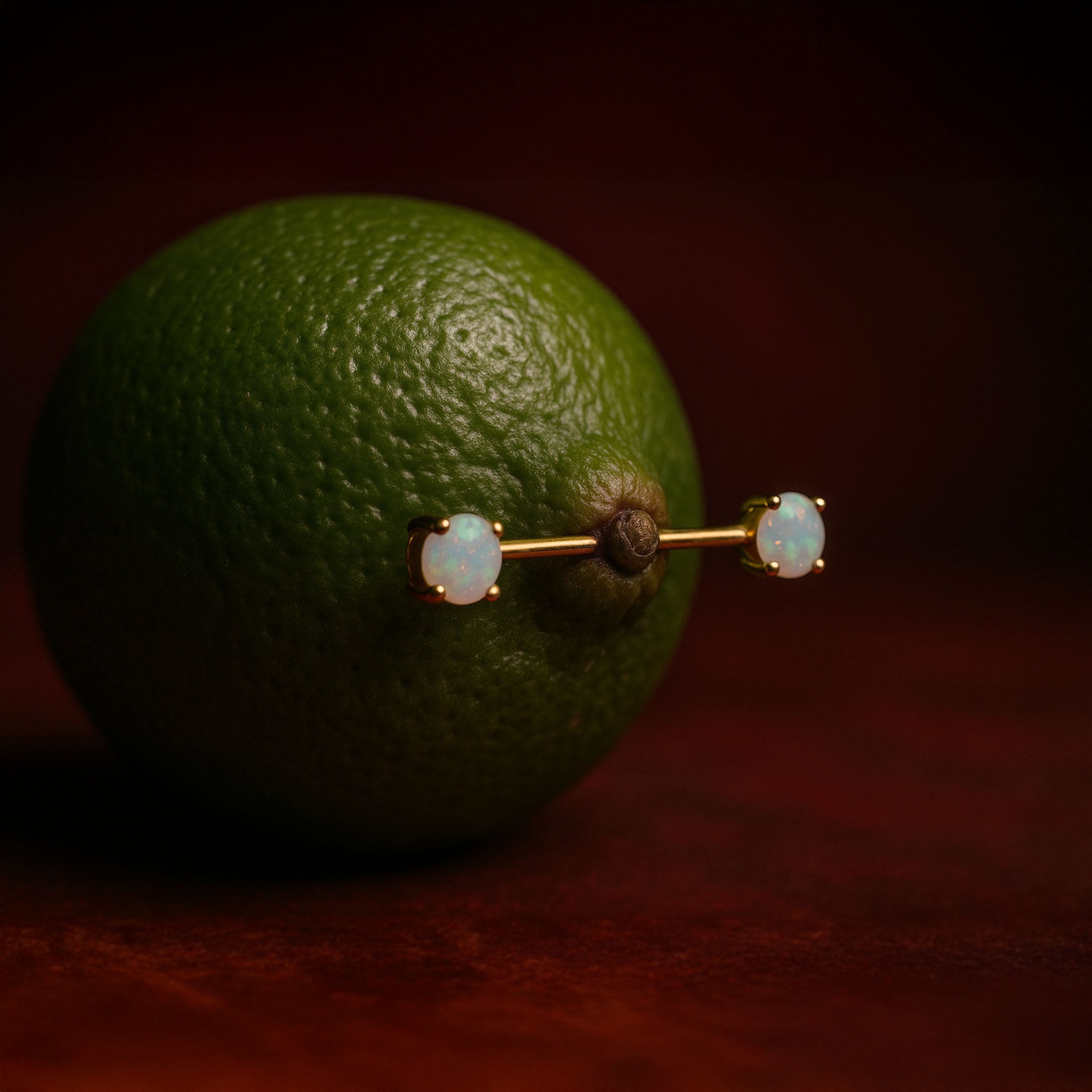Odyssey Double Opal Nipple Bar Piercing On Fruit - Gold