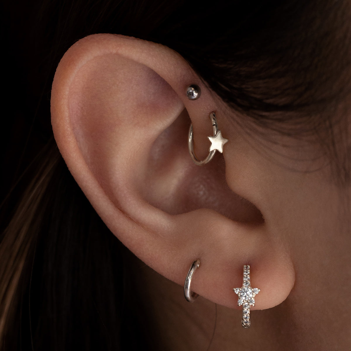 Star Helix Tragus & Cartilage Hoop Piercing On Model - Silver