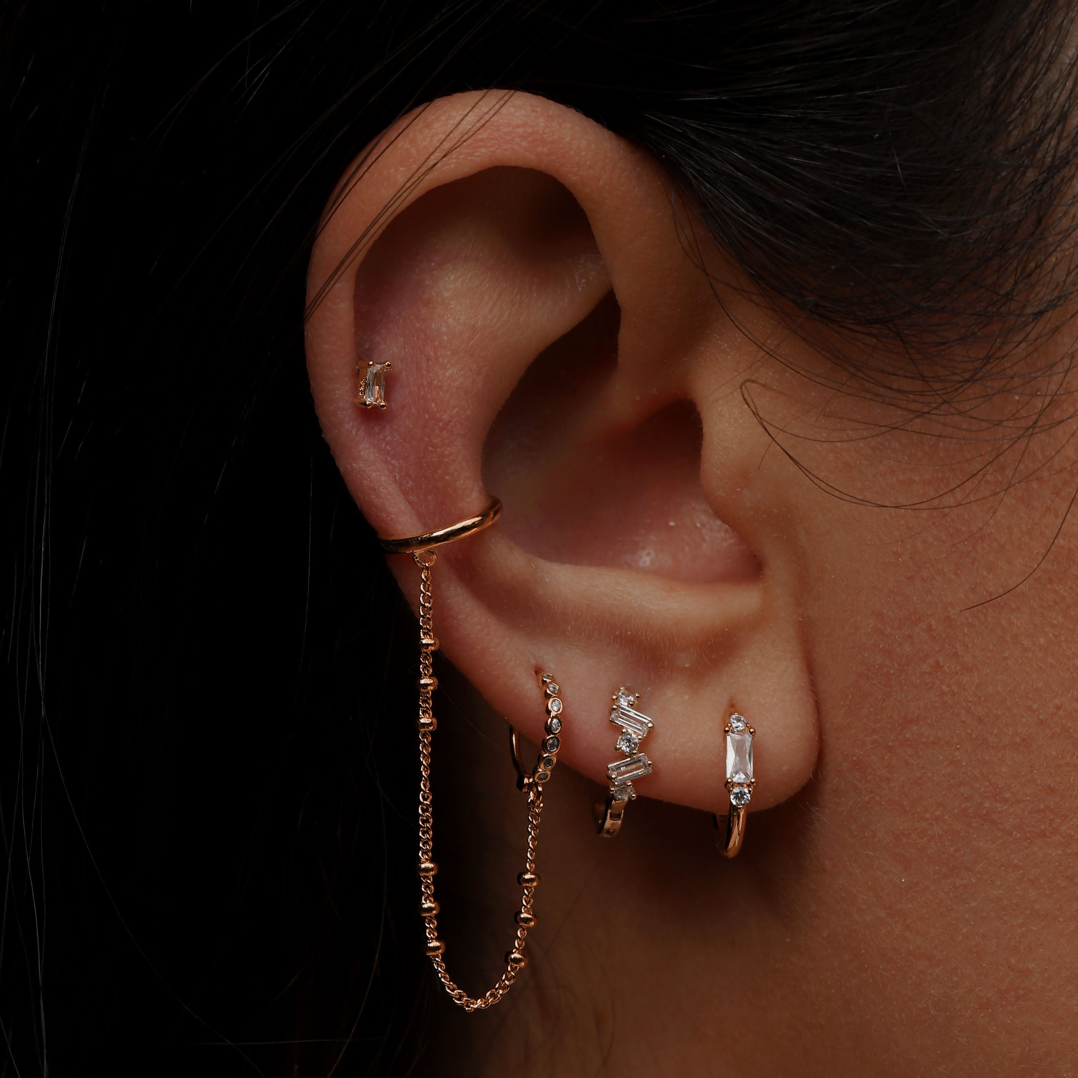 Bounty Baguette Gemstone Helix Tragus Cartilage & Conch Ear Piercing On Model - Rose Gold