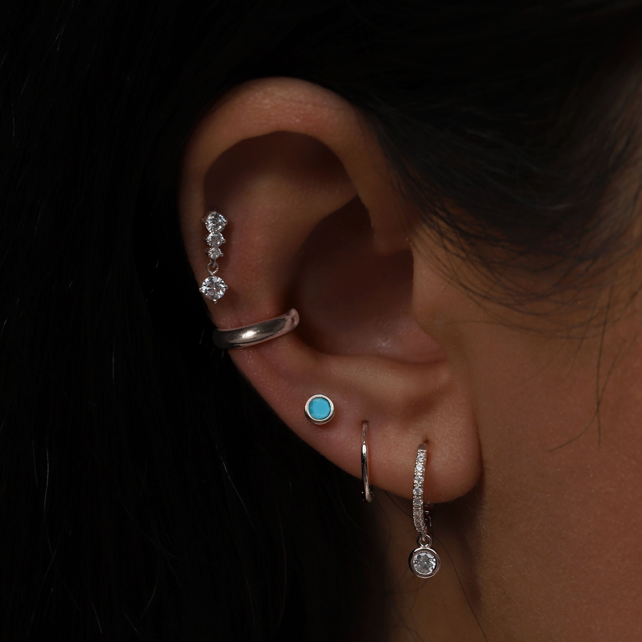 December Birthstone Tragus Helix & Conch Ear Piercing On Model - Silver 