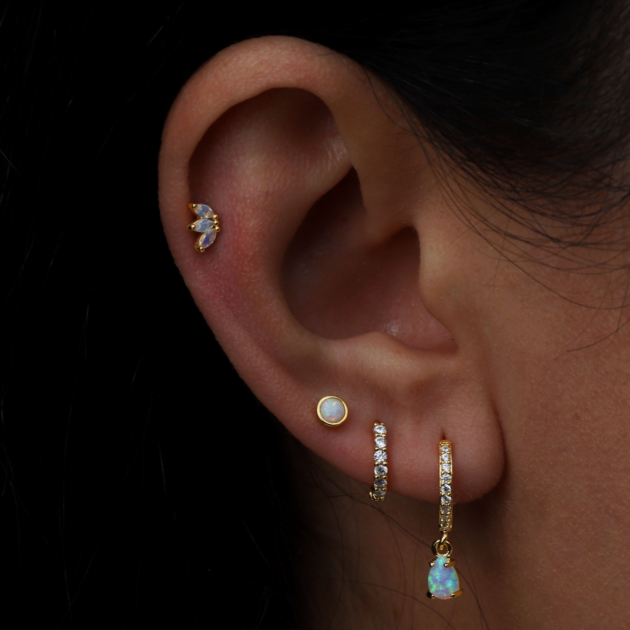 October Birthstone Tragus Helix Cartilage & Conch Ear Piercing On Model - Gold