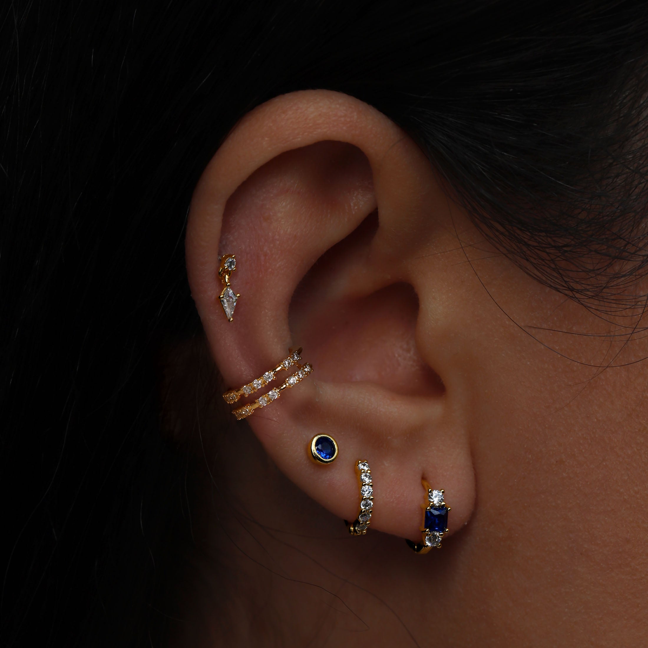 September Birthstone Tragus Helix & Conch Ear Piercing On Model - Gold