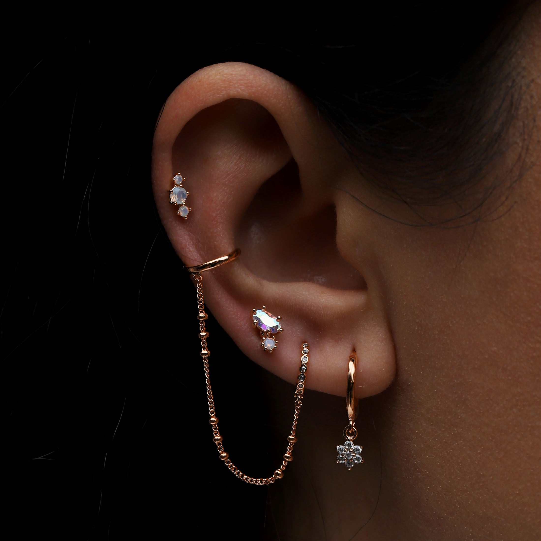 Elvie Gemstone Helix Tragus Cartilage & Conch Ear Piercing On Model - Rose Gold