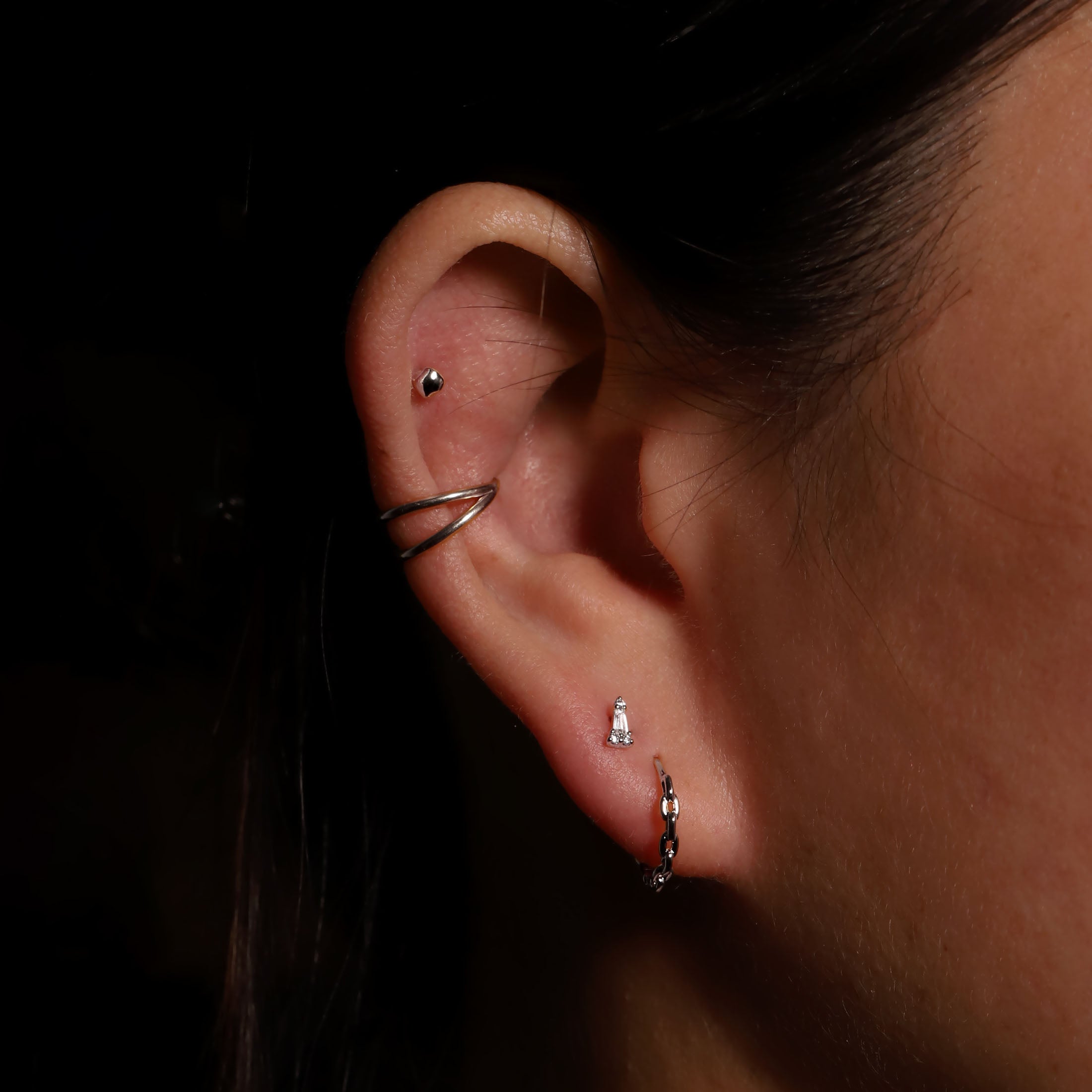 Lyra Tapered Gemstone Helix & Cartilage Ear Piercing On Model - Sterling Silver