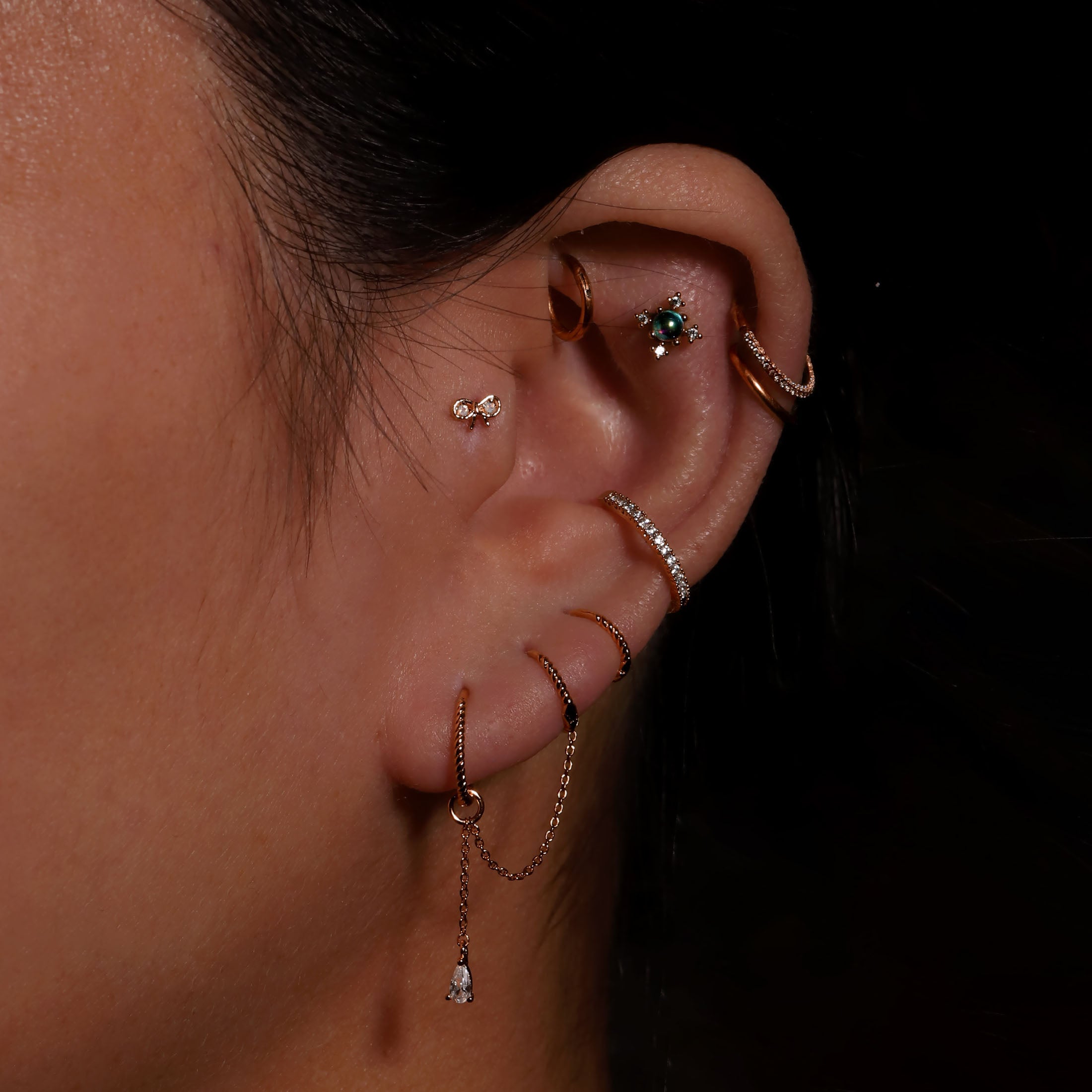 Mira Bow Moonstone Helix Tragus & Cartilage Ear Piercing On Model - Rose Gold