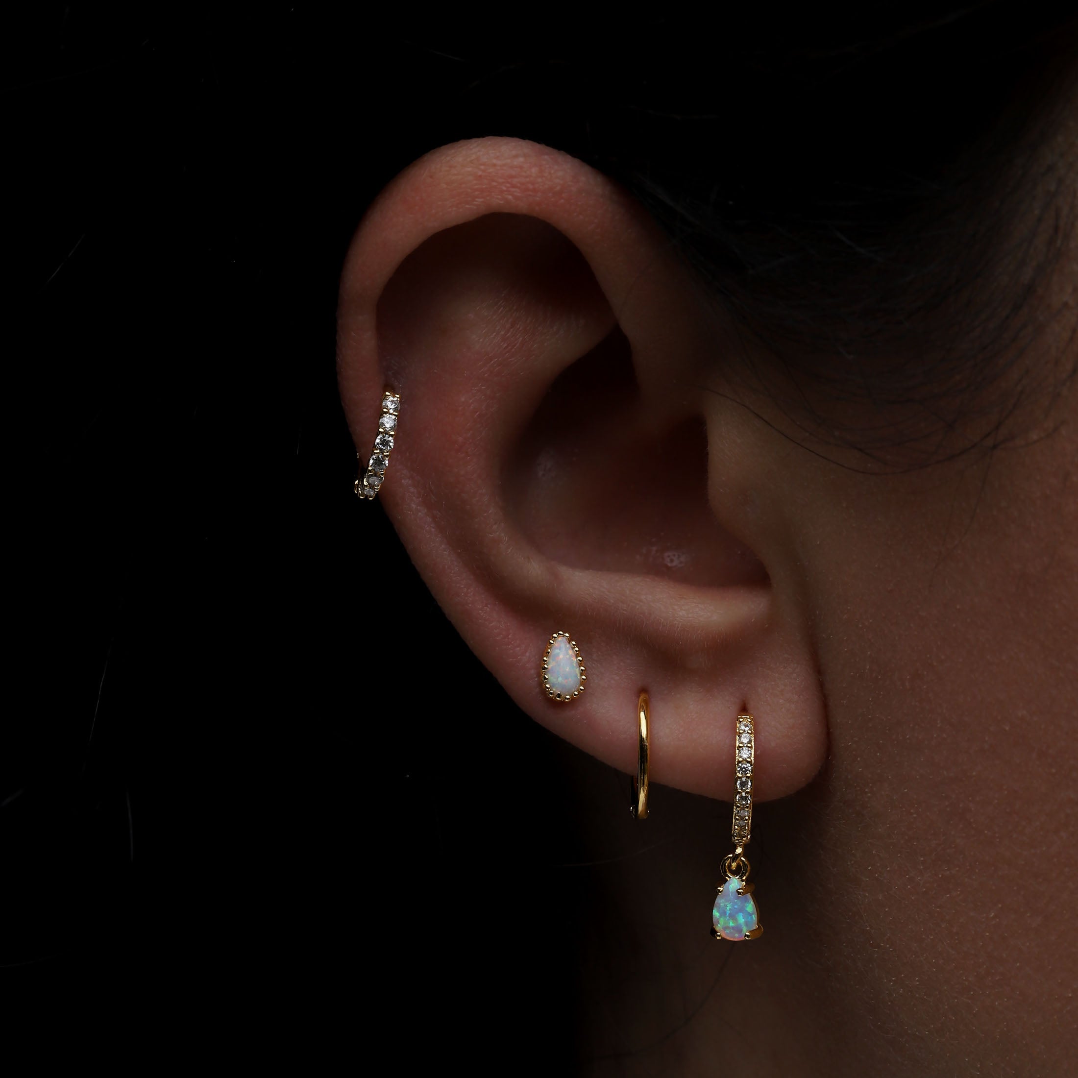 Penelope Opal Helix Tragus Cartilage & Conch Ear Piercing On Model - Gold