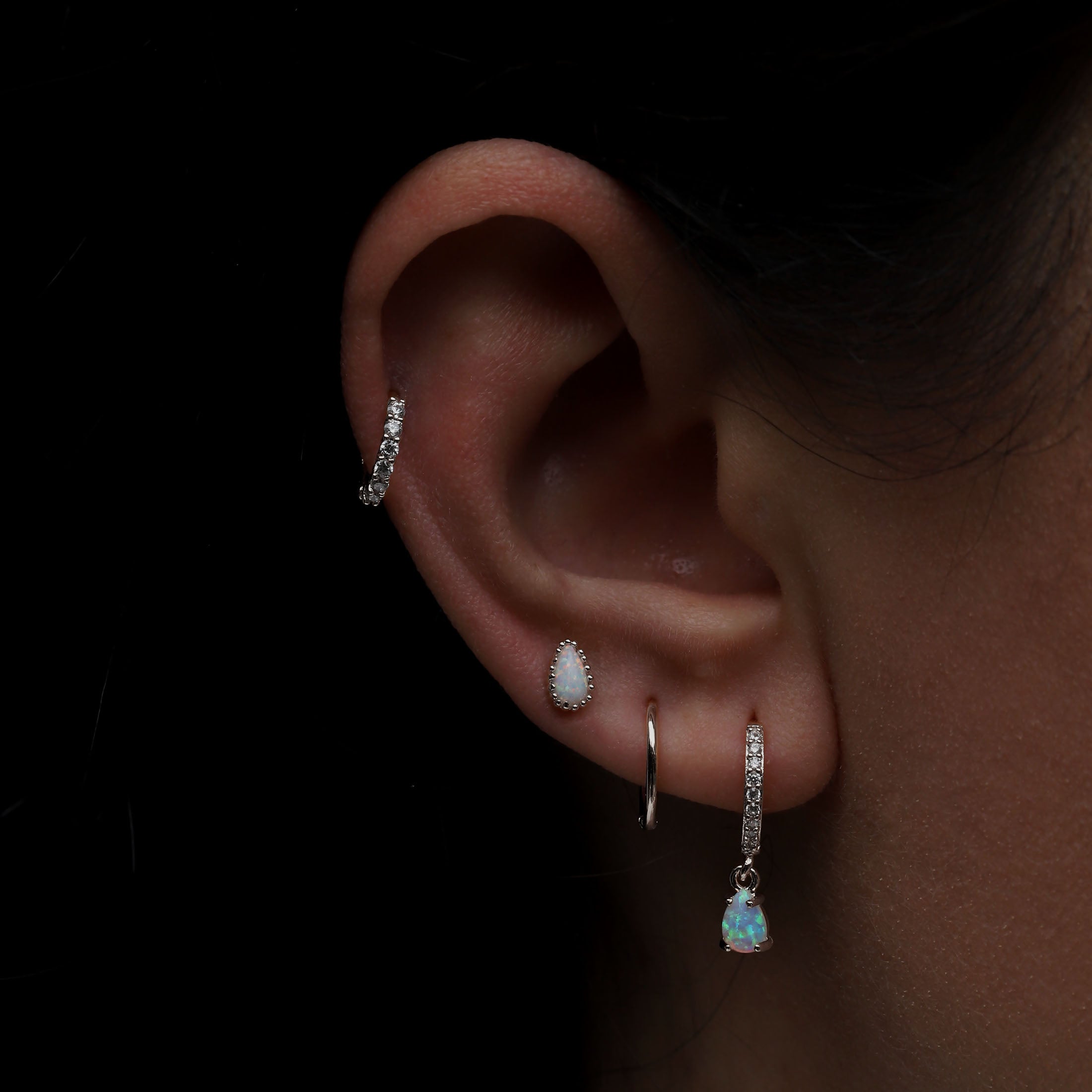 Penelope Opal Helix Tragus Cartilage & Conch Ear Piercing On Model - Silver
