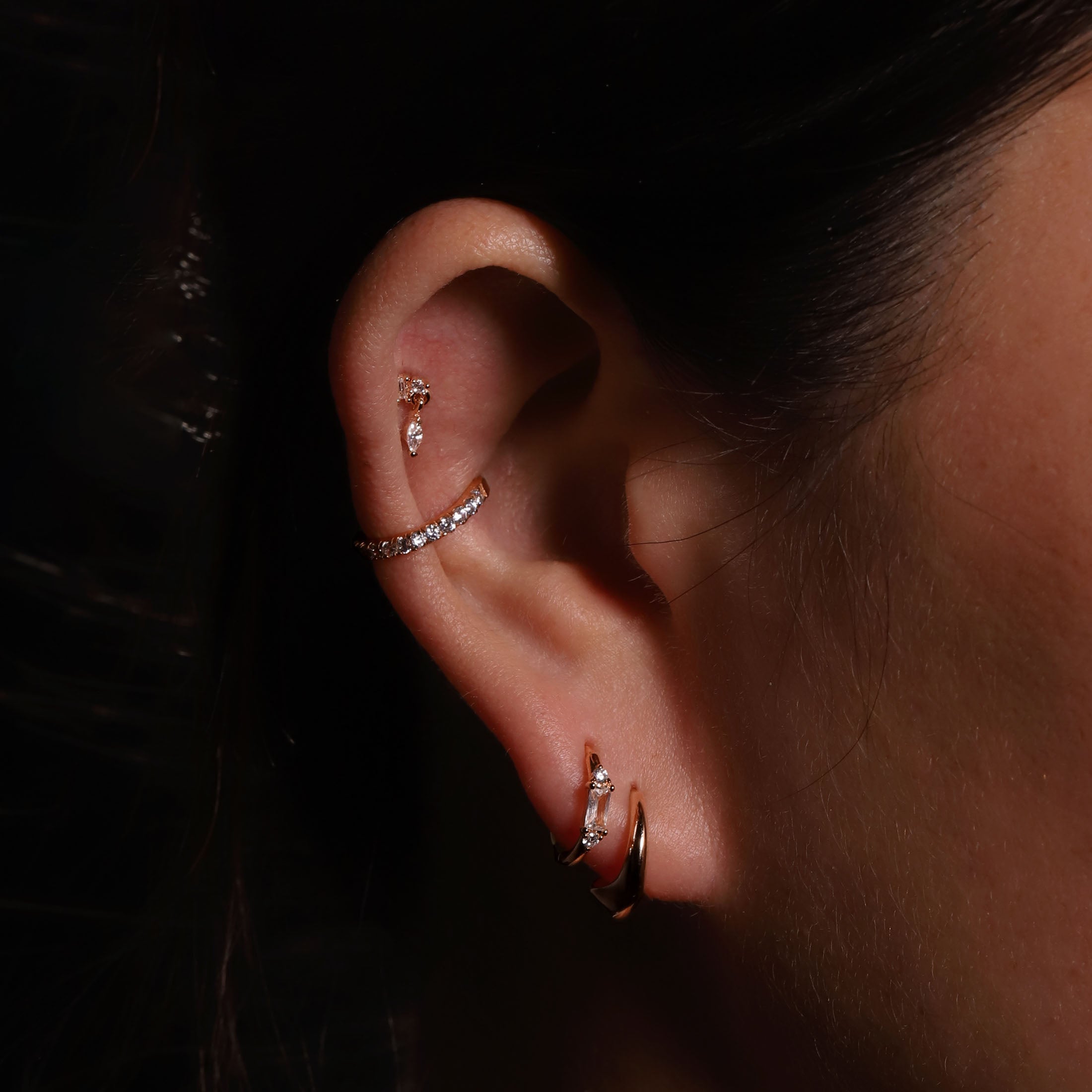Elixir Curved Geometric Hoop Earrings On Model - Rose Gold