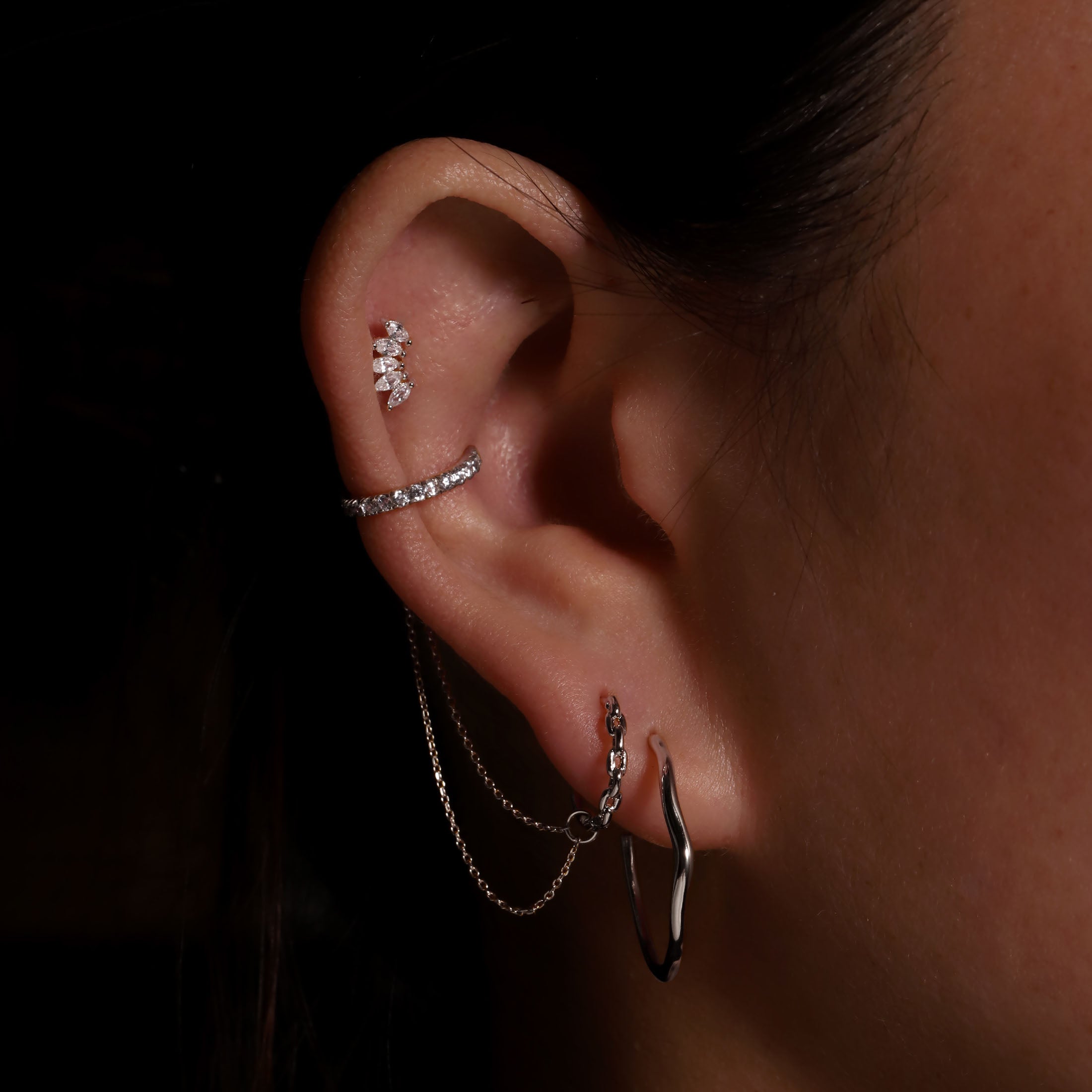 Motion Wave Hoop Earrings On Model - Silver