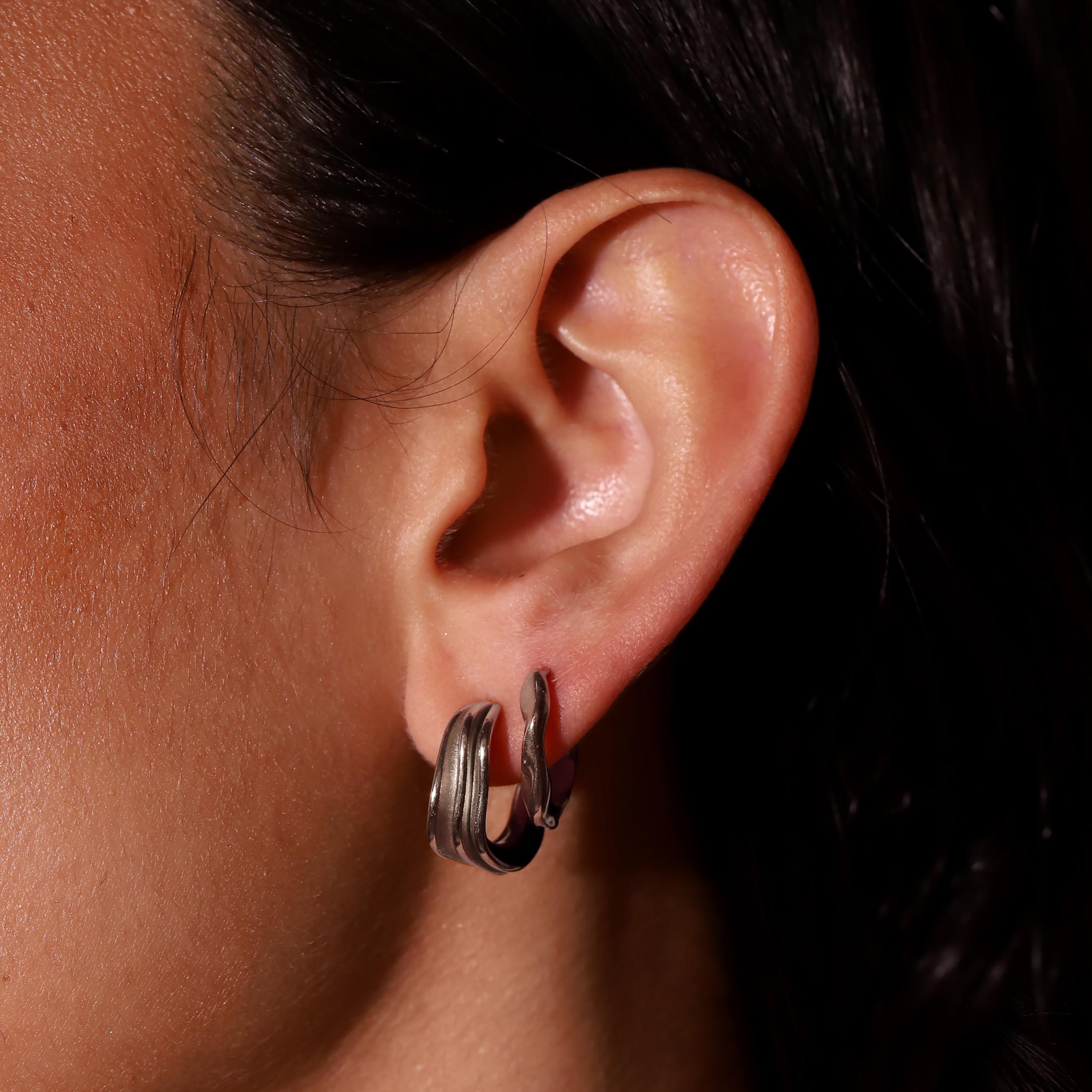 Tidal Half Hoop Earring Studs On Model - Silver